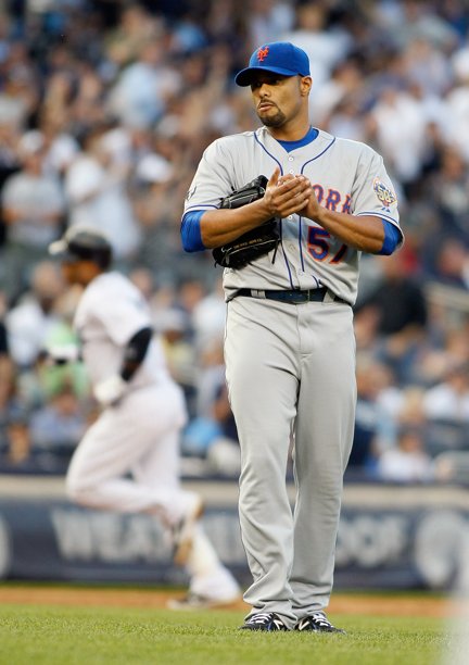 Johan Santana can't watch Robinson Cano round bases following his first of 2 homers on the night