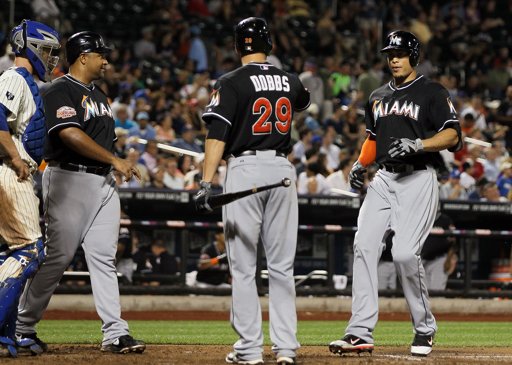 Giancarlo Stanton touches home after 2nd homer on the night